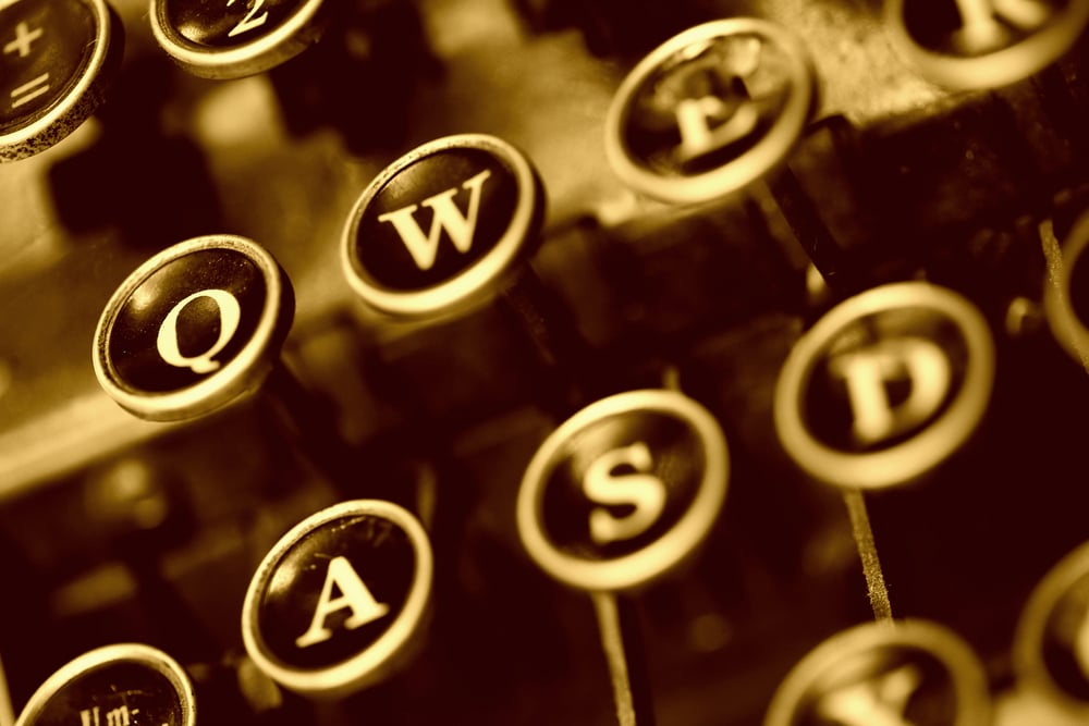 aged typwriter keys in antique sephia tones
